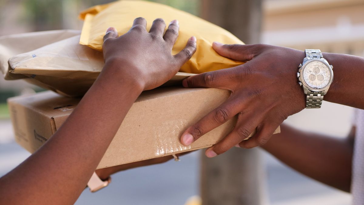 An image showing someone delivering packages.